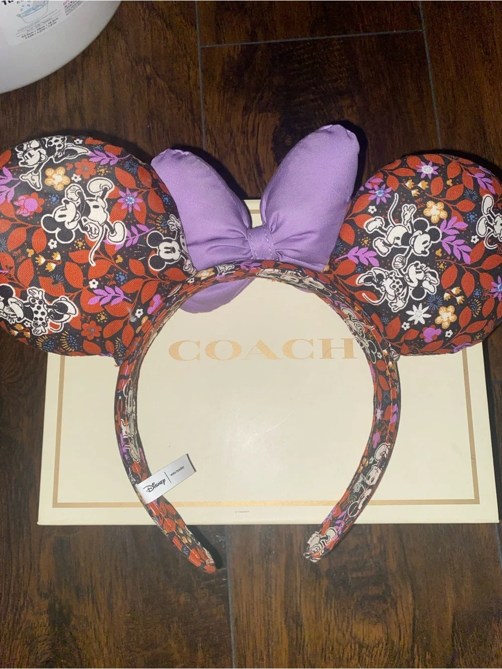 Disney Floral Minnie Ear Headband with Purple Bow by Coach